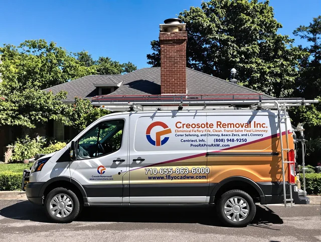 Ocala Chimney Sweep technician removing creosote safely in Ocala, FL